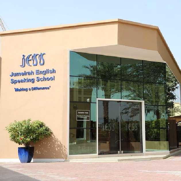 JESS Dubai campus with students participating in outdoor sports and arts activities